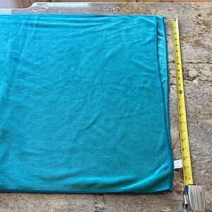 Turquoise Microfiber Towel, 66x23 approximately. Easy to pack.